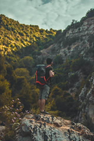  A hiker standing on a cliff