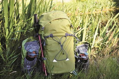 An Aarn backpack on a trail