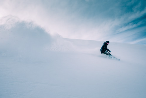 Person skiing during daytime.