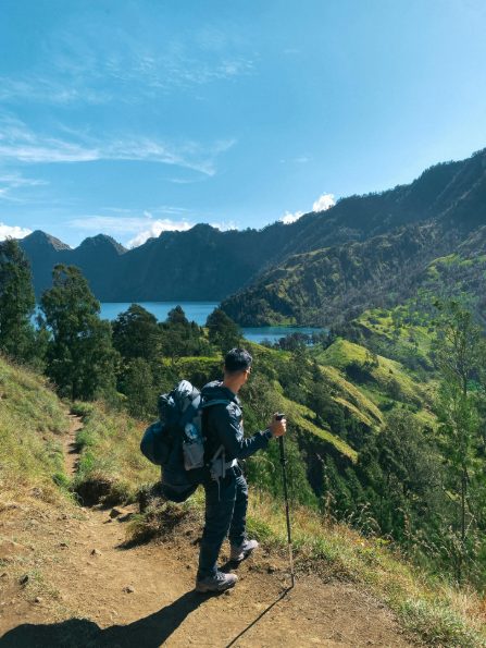 A person carrying a long-distance trekking backpack.