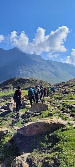 a group walking on a rocky path