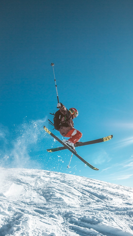 Person skiing with an ultralight pack